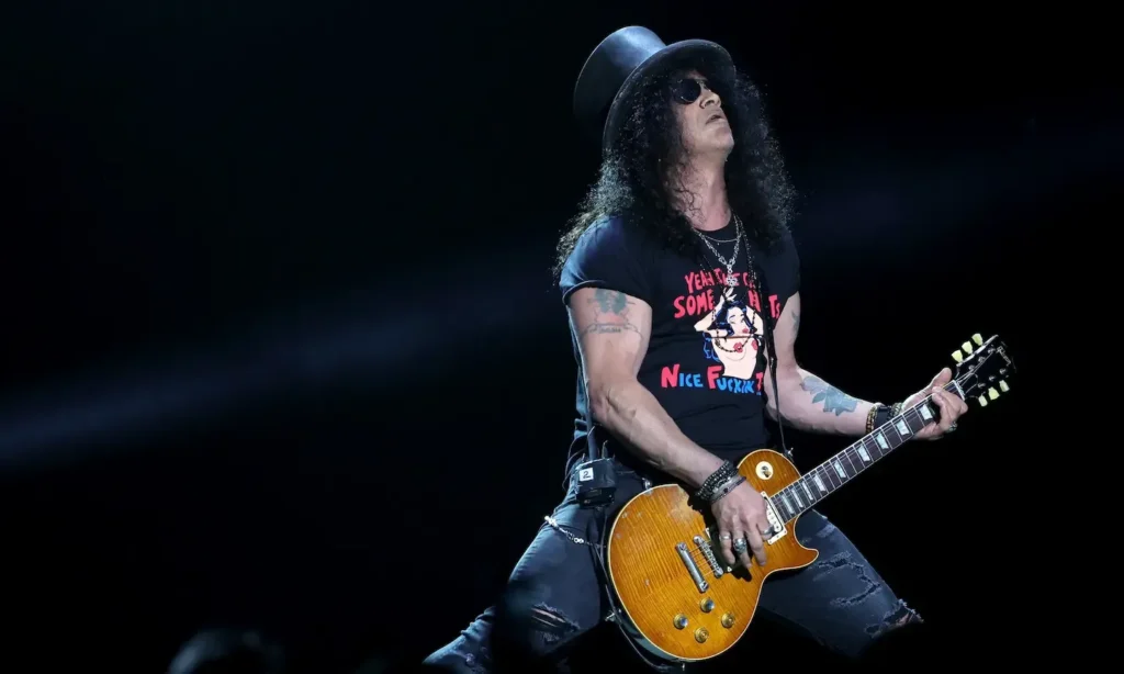 MUSISI LEGENDARIS YANG MEMILIH MENGGUNAKAN GIBSON LES PAUL - Slash gitaris Guns N 'Roses